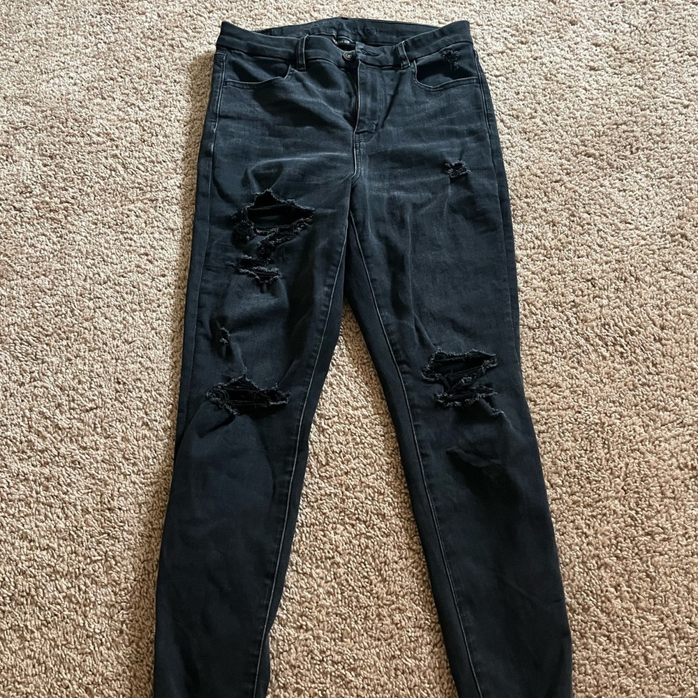 American Eagle the dream Jean ultra distressed shark bite hem skinny jeans